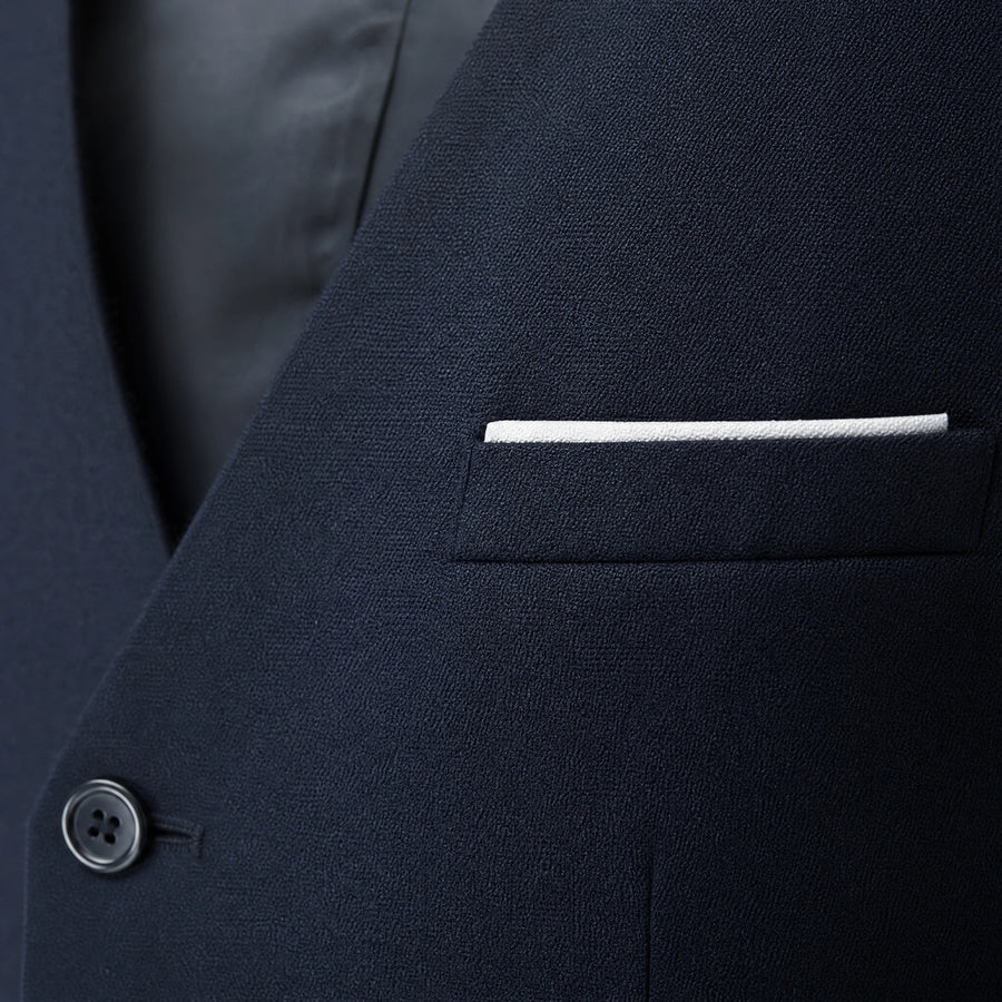 Gilet sans manches homme ajusté à quatre boutons - close-up détail matière