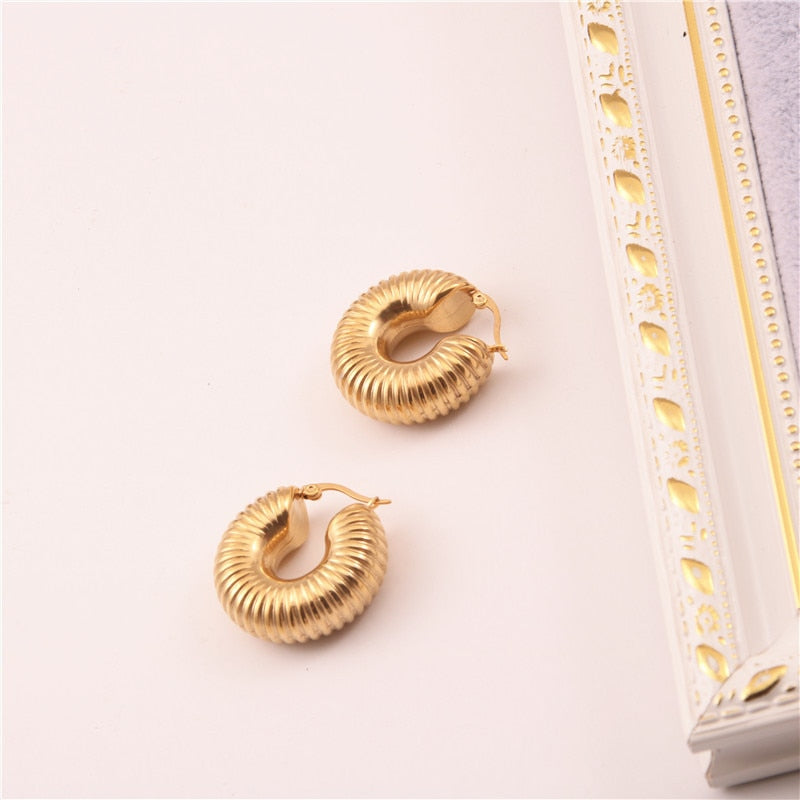 Paire de boucles d'oreilles année 80 - Montres & Bijoux Paire de boucles d'oreilles année 80 - Montres & Bijoux