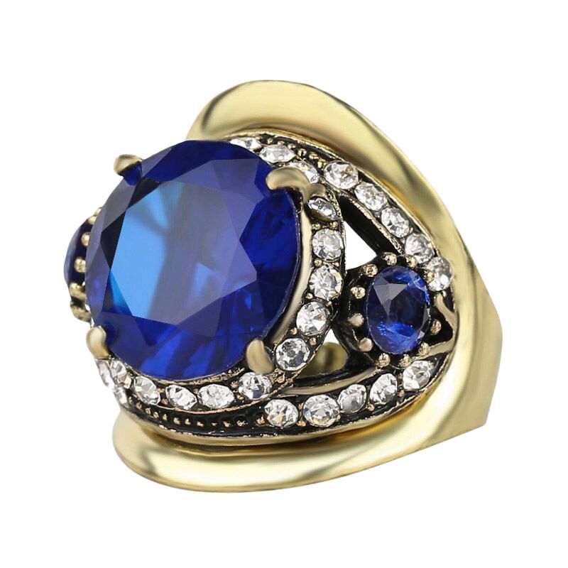 Bague vintage en pierre bleue foncée main image 0