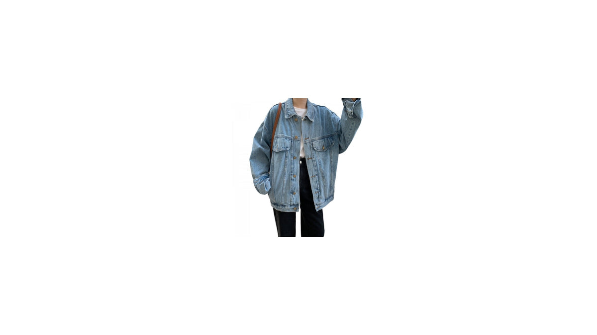 Veste en jean oversize au centre, point de départ d’un style rétro personnel Image