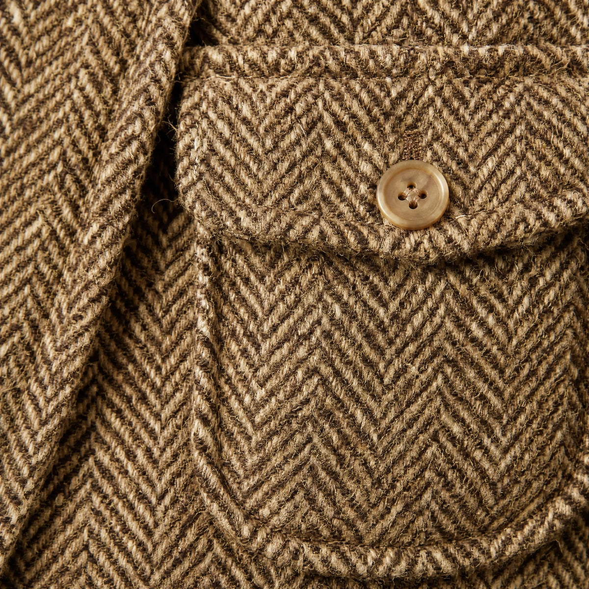 Gilet en tweed à boutonnage simple et col en V - close-up détail matière