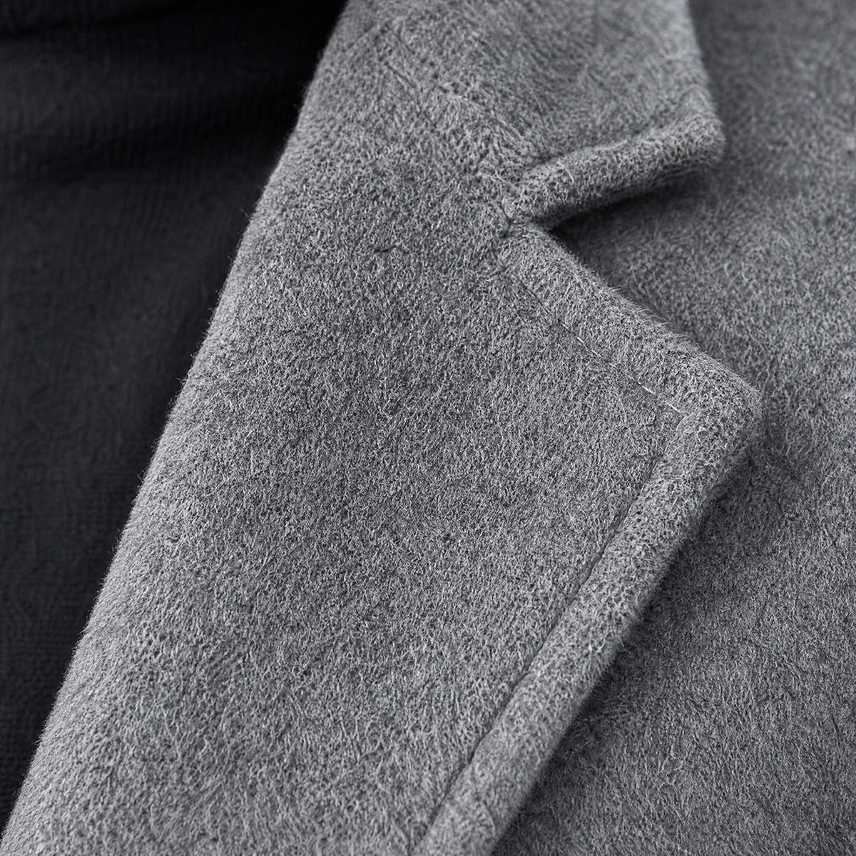 Manteau mi-long uni à revers crantés vintage - close-up détail matière