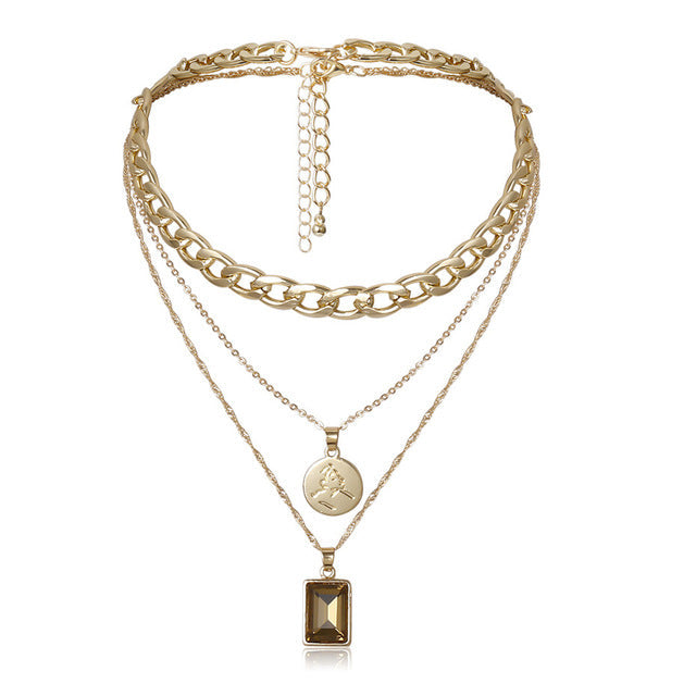 collier-pendentif-medaille-multicouche-vintage