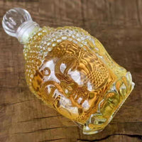 bouteille-en-tete-de-bouddha-vintage