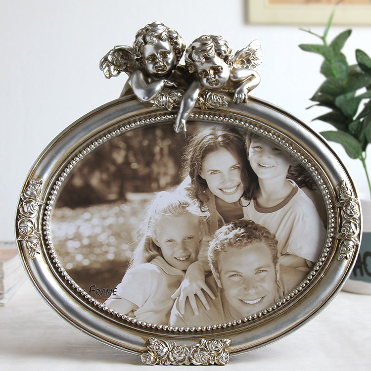 cadre-photo-ovale-en-resine-blanc-argente-retro