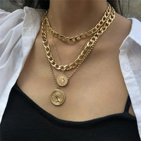 collier-pendentif-medaille-multicouche-vintage