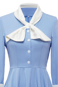 robe-bleue-en-trapeze-annee-80-avec-noeud-papillon
