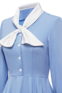robe-bleue-en-trapeze-annee-80-avec-noeud-papillon