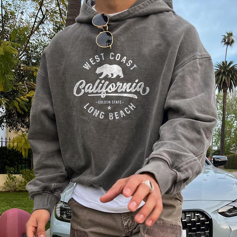 sweat-capuche-imprime-graphique-coupe-ample-vintage